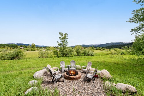 Spacious home with game room, furnished deck & golf course view