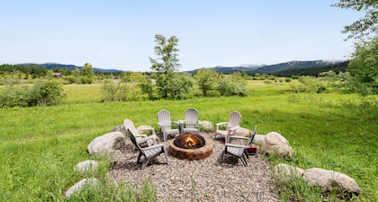 Spacious home with game room, furnished deck & golf course view