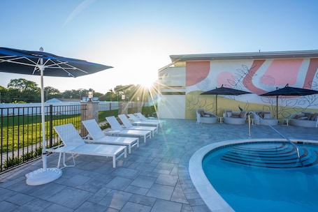 Seasonal outdoor pool, open 8:00 AM to 8:00 PM, pool umbrellas. The Bentley Hotel Southampton