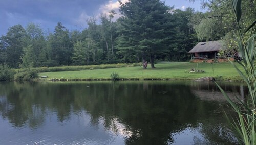 Rustic escape on a pond with 7 acres in Colebrook, CT!