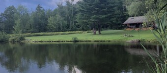 Rustic escape on a pond with 7 acres in Colebrook, CT!