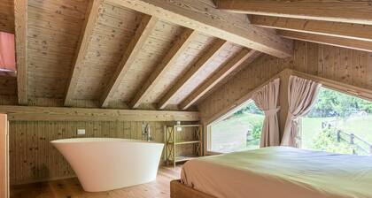 Wunderschönes „Chalet dell'Orso“ mit WLAN, Whirlpool und privatem Garten