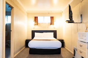 Frigobar, cortinas blackout, Wi-Fi de cortesia, roupa de cama