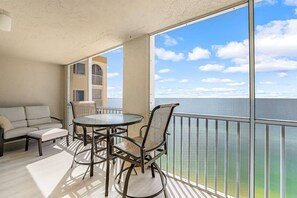 Outdoor dining - Lovely, Gulf Front Condo! Spectacular Sunsets on Your 7th Floor Balcony! Pool! Private Beach! (Bonita Springs)