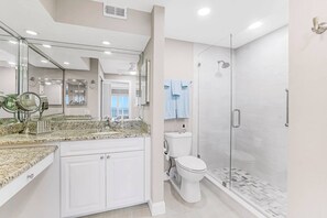 Combined shower/tub, hair dryer, towels, shampoo