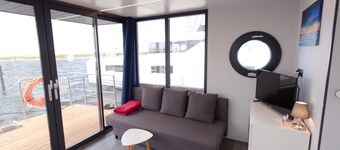 Houseboat Fjord Aquila with roof terrace in Wendtorf