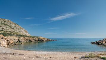 Una playa cerca, toallas de playa