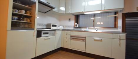 Fridge, microwave, stovetop, cookware/dishes/utensils