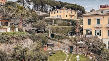 Suite Romantica, 2 letti singoli, non fumatori, vista mare parziale | Vista giardino