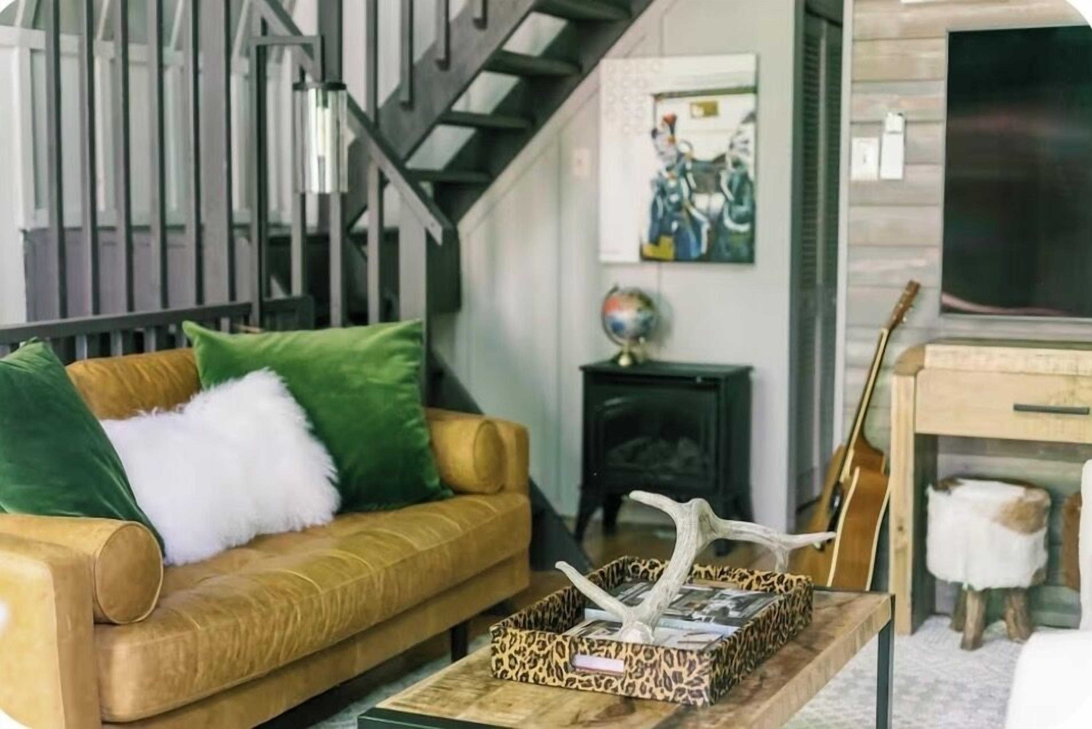 Smart TV, fireplace, books, smart speakers