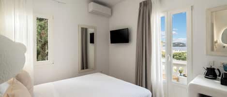 خزنة داخل الغرفة ومكواة/لوح كي وواي فاي مجانًا وملاءات أسرّة