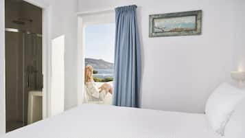 Deluxe Double Room, Partial Sea View | In-room safe, iron/ironing board, free WiFi, bed sheets