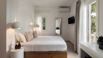 Deluxe Double Room, Partial Sea View | In-room safe, iron/ironing board, free WiFi, bed sheets