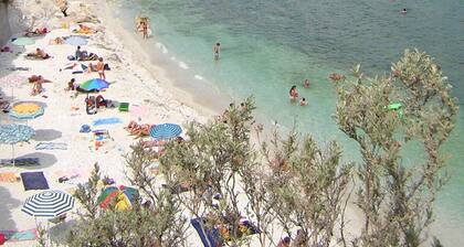 Two-room apartment with garden and private parking space