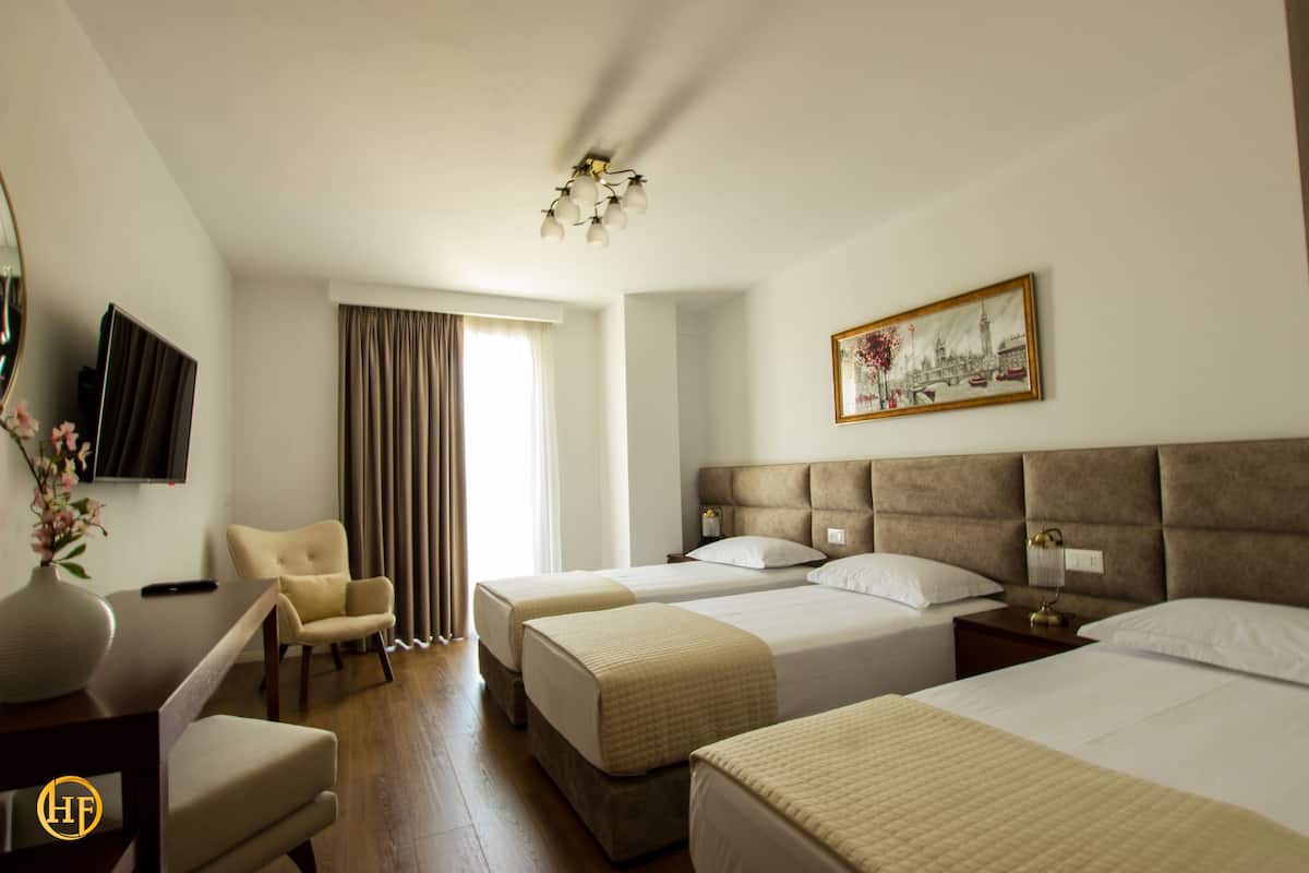 Deluxe Triple Room | In-room safe, desk, free WiFi, bed sheets