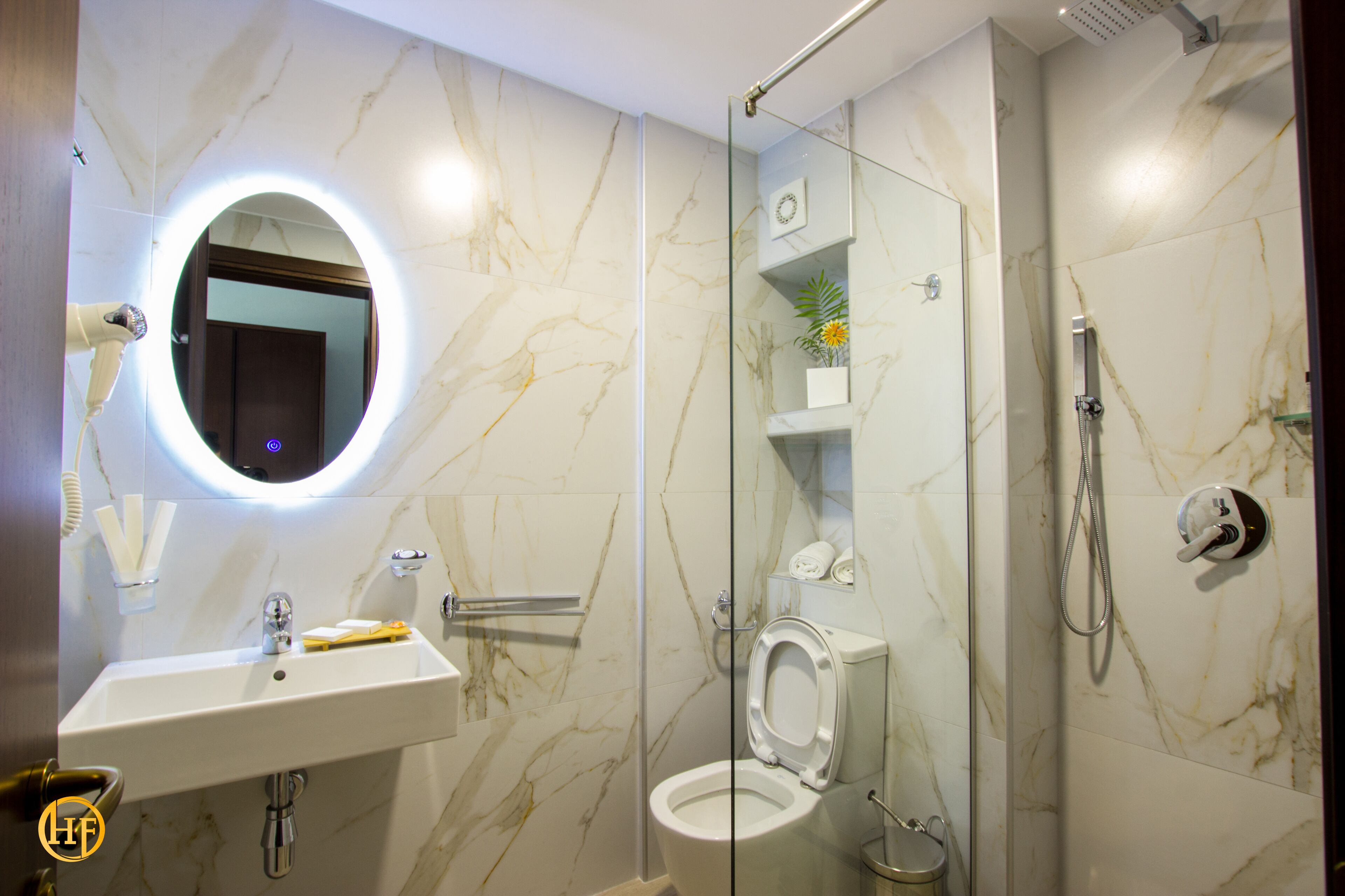 grand double or twin room | bathroom | hair dryer, towels, soap, toilet paper