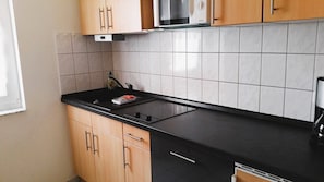 Fridge, microwave, dishwasher, coffee/tea maker