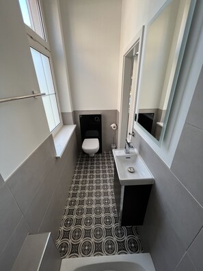 Hair dryer, towels, soap, toilet paper