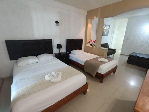 Standard Suite, Multiple Beds, Non Smoking, Balcony | Free WiFi, bed sheets - Hotel Dos Mundos, Isla Cozumel (Cozumel)