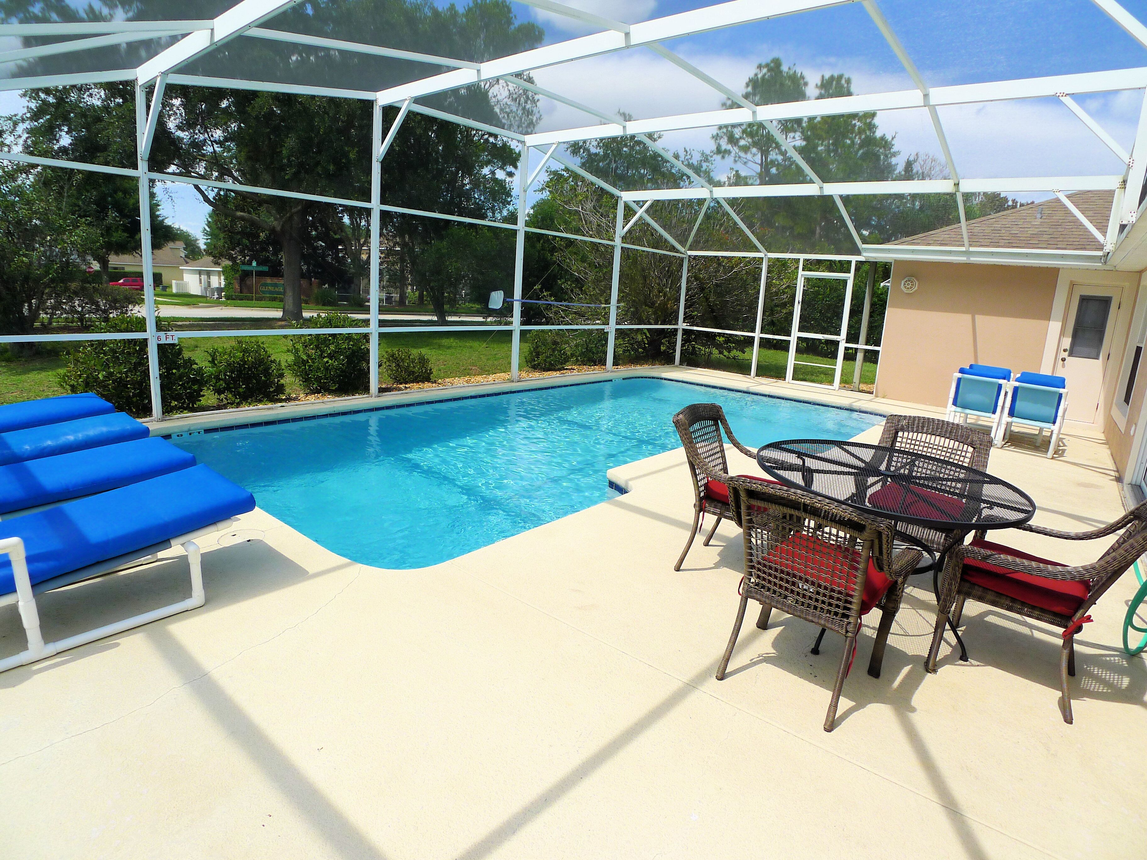 A heated pool, sun loungers