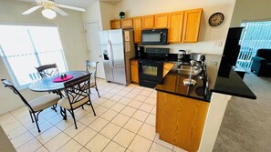 Fridge, microwave, oven, stovetop - Private, Refurbished pool home with privacy! (Davenport)