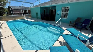 A heated pool, pool loungers