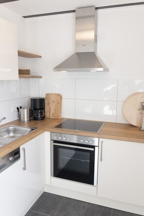 Réfrigérateur, four, plaque de cuisson, lave-vaisselle