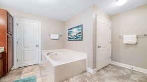 Shower, jetted tub, hair dryer, towels
