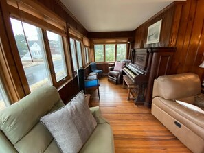 TV, fireplace, books