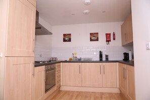 Fridge, microwave, oven, stovetop - The Penthouse With Balcony (29)  (Oldham)