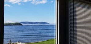 Panoramic Room, 1 Queen Bed, Ensuite, Ocean View | Premium bedding, pillowtop beds, individually decorated - St. Ann's Motel (South Haven)
