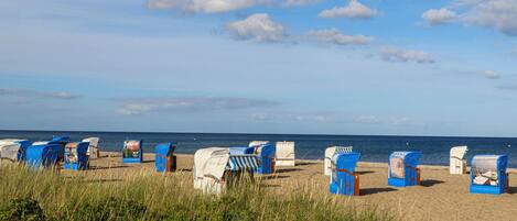 On the beach, fishing
