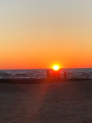 Enjoy a serene beachside evening with breathtaking ocean views.