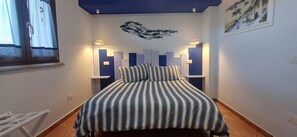 2 bedrooms, in-room safe, iron/ironing board, travel cot