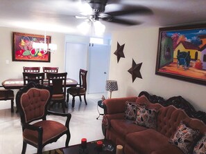 Living area - beautiful, new and cozy apartment with pool and security entry (Santo Domingo norte)