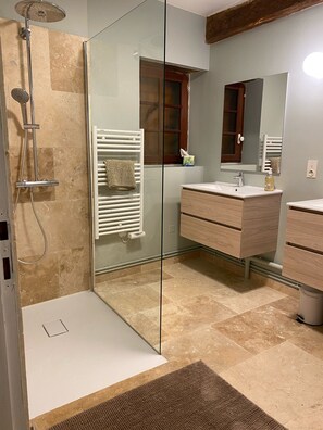 Shower, hair dryer, towels, soap