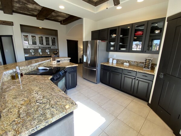 Coffee/tea maker, fridge, microwave, oven