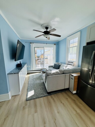 Ocean Views, seconds to the beach, and a 5 minute walk to downtown shopping!