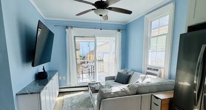 Ocean Views, seconds to the beach, and a 5 minute walk to downtown shopping!