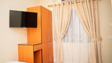 Desk, laptop workspace, free WiFi, bed sheets