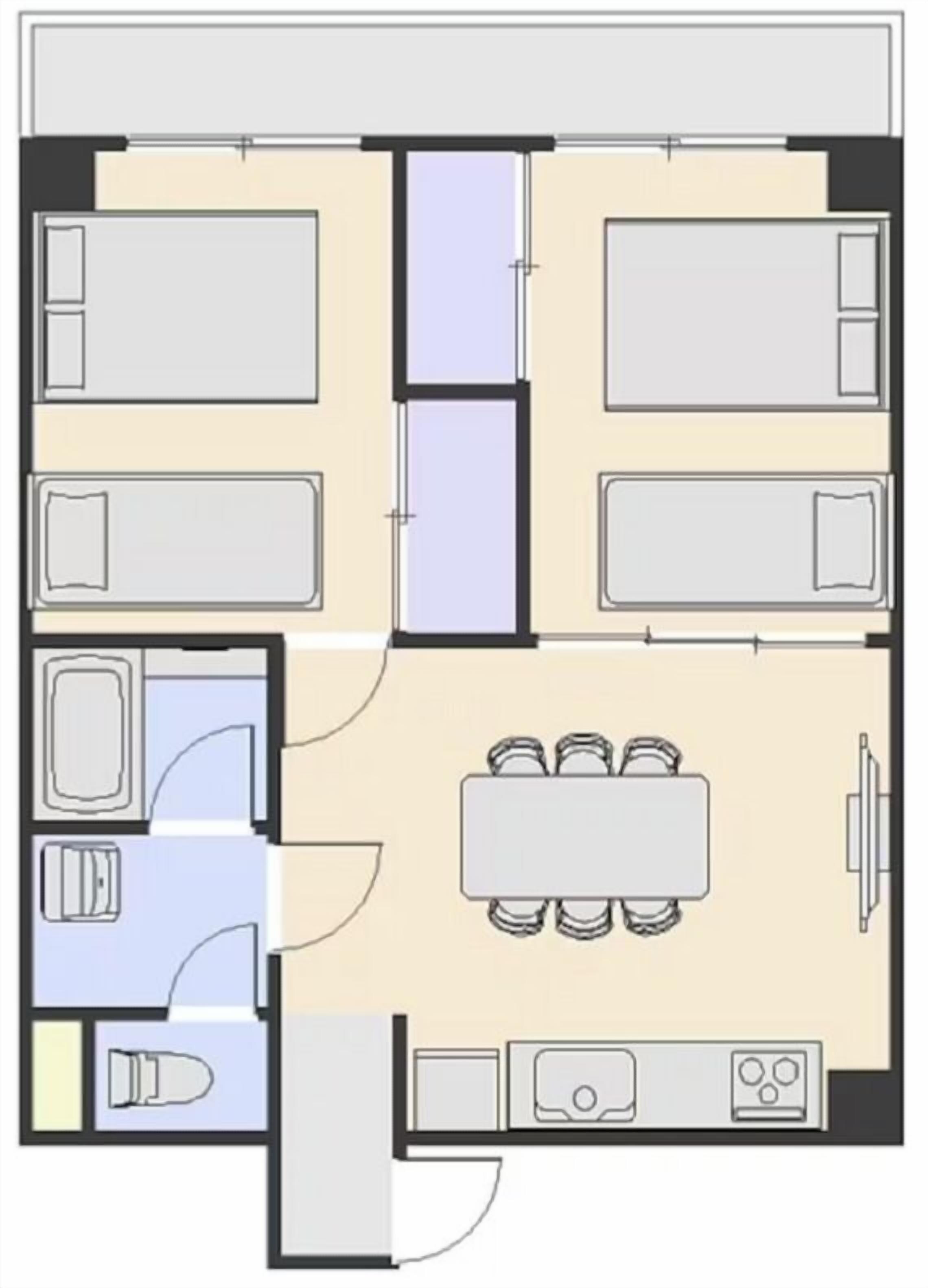 A floor plan of a hotel room with a bed, a desk, a chair, a bathroom, and a small kitchenette.