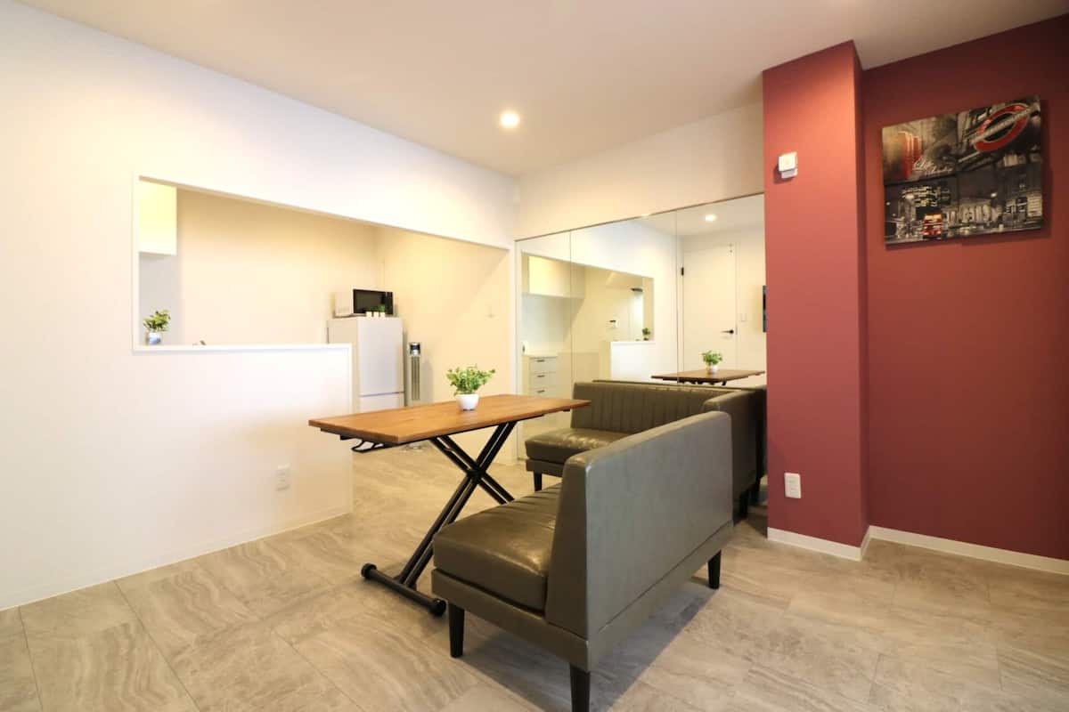 Basic Apartment | Living area | Flat-screen TV