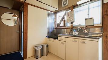 Fridge, microwave, stovetop, cookware/dishes/utensils