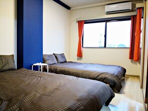 Appartement, 2 slaapkamers | 2 slaapkamers, verduisterende gordijnen, een strijkplank/strijkijzer