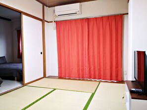 Apartment, 2 Bedrooms | Living area | Flat-screen TV