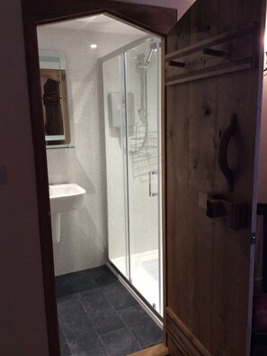 Combined shower/tub, hair dryer, towels, soap