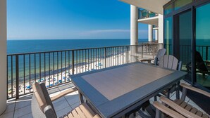A balcony with a view of the beach and ocean. - The Oasis of Orange Beach 1007 (Orange Beach)