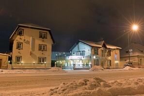 Front of property - evening/night - Pensiunea Luiza (Brasov)