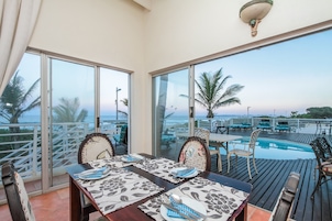King Room with Balcony - Sea View | Living area | 32-inch TV with digital channels