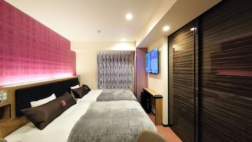 Down duvets, desk, blackout curtains, iron/ironing board